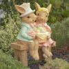 Fancy Rabbit Couple Sitting on Bench Garden Statue